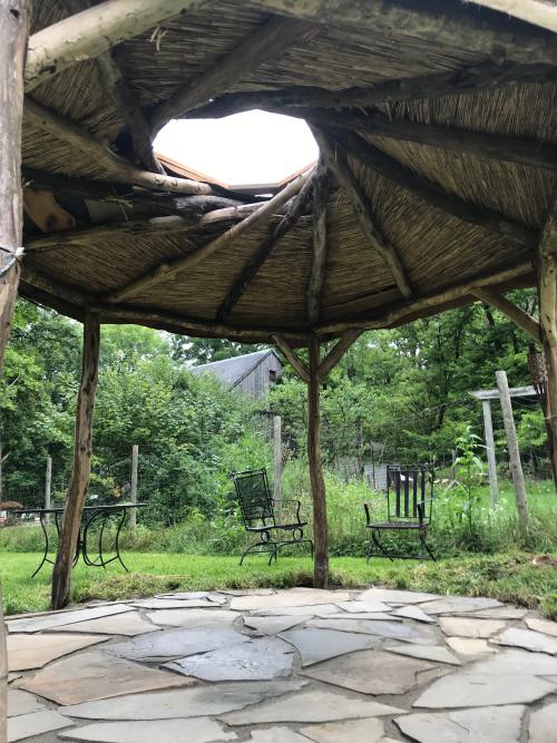 Black locust posts and timbers support the living reciprocal roof